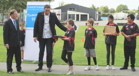 Prime Minister Key and children participating in KiwiSport programmes